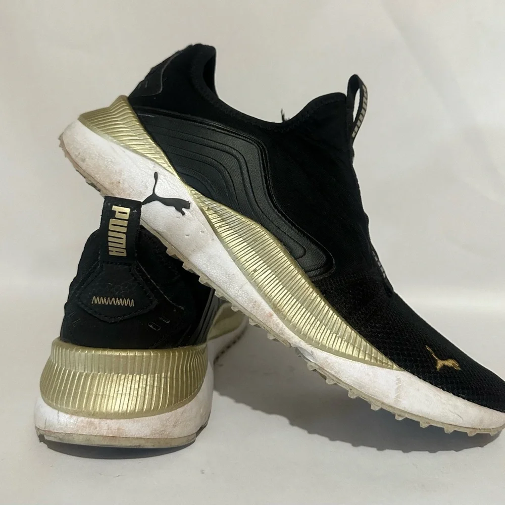 Puma Women’s Black and Gold Athletic Shoes
